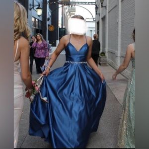Blue Cinderella style prom/pagent dress. Size 5 with lace up back. Fits like 5-8